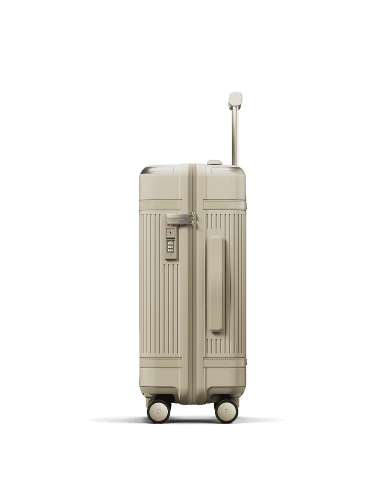 Paravel Aviator Carry-On in Nantucket Cream, side view showing depth and side handle